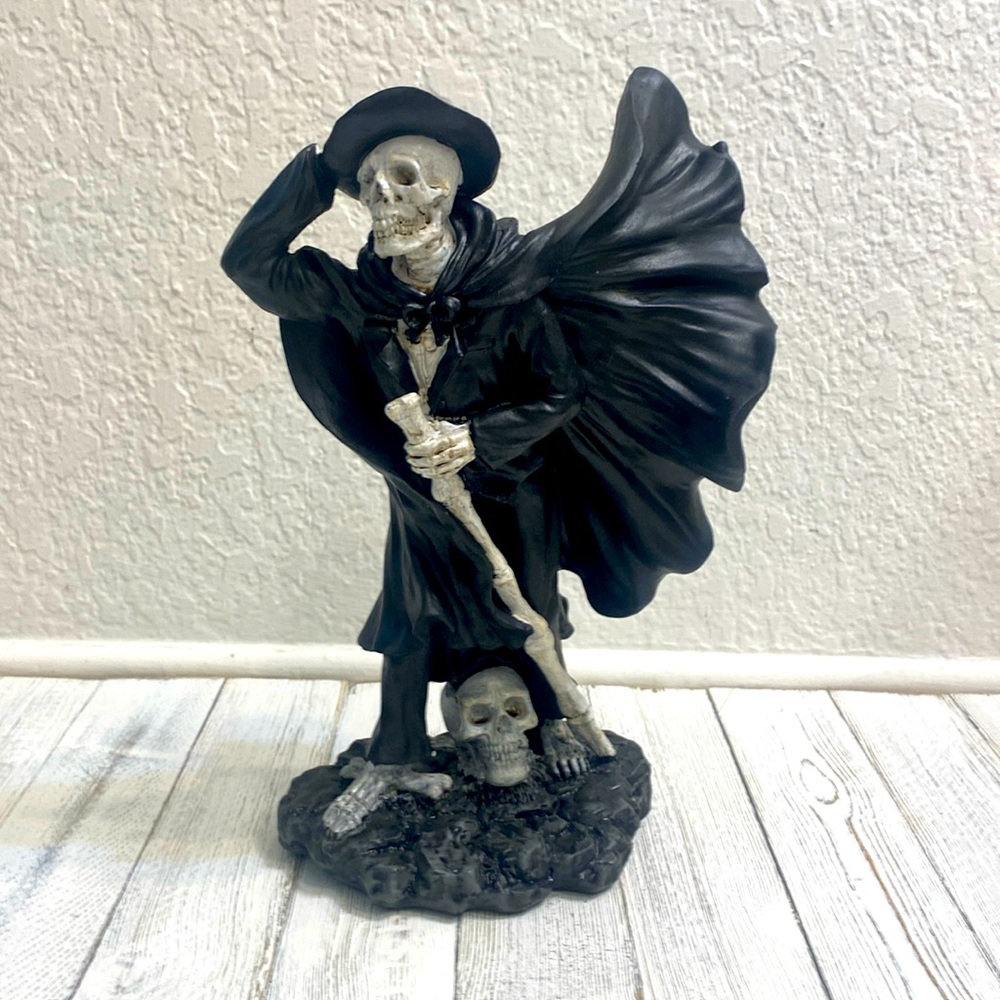 Skeleton Holding Hat in Wind - Picture 1 of 8